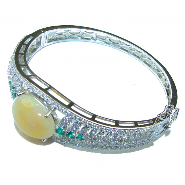 Absolutly spectacular CASCADE OF LIGHTS 25.5 carat Golden Ethiopian Opal .925 Sterling Silver Bracelet bangle