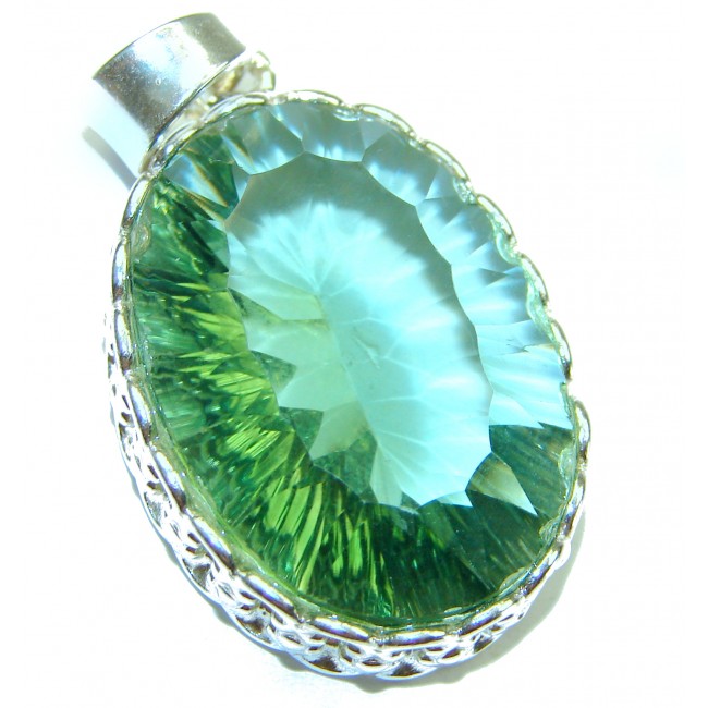 18.2 carat oval cut Mystic Green Aurora Topaz .925 Sterling Silver handcrafted Pendant