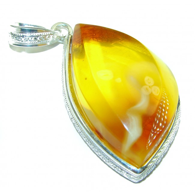 The best quality authentic Golden Baltic Amber .925 Sterling Silver handcrafted pendant