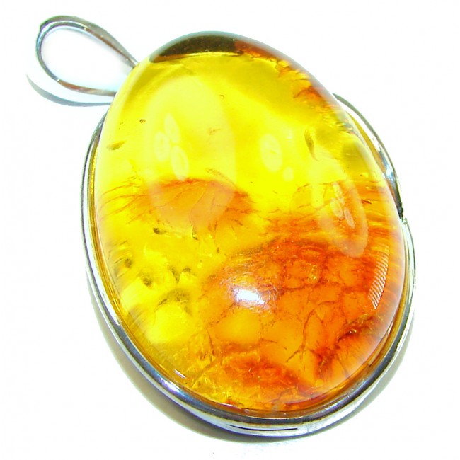 The best quality authentic Golden Baltic Amber .925 Sterling Silver handcrafted pendant