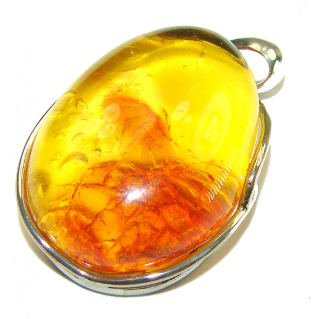 The best quality authentic Golden Baltic Amber .925 Sterling Silver handcrafted pendant