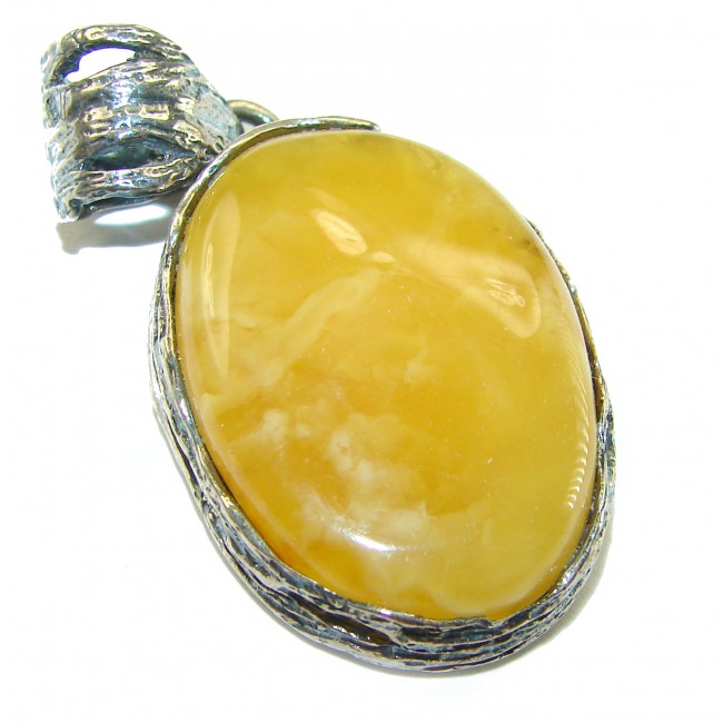 Authentic butterscotch Baltic Amber .925 Sterling Silver handcrafted pendant