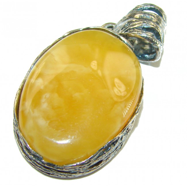 Authentic butterscotch Baltic Amber .925 Sterling Silver handcrafted pendant