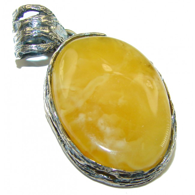 Authentic butterscotch Baltic Amber .925 Sterling Silver handcrafted pendant