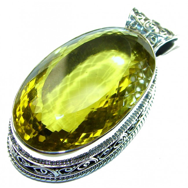 58.6 carat Oval cut flawless Lemon Quartz .925 Sterling Silver handcrafted pendant