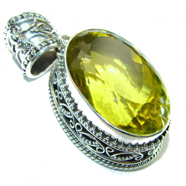 55.6 carat Oval cut flawless Lemon Quartz .925 Sterling Silver handcrafted pendant