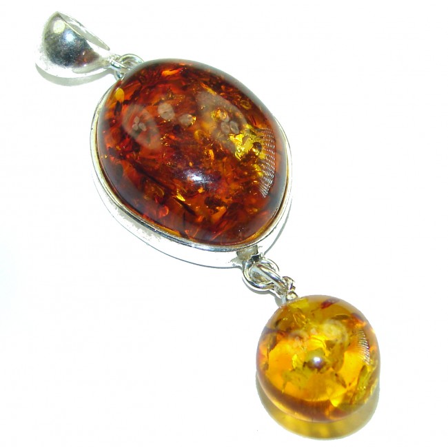 The best quality authentic Golden Baltic Amber .925 Sterling Silver handcrafted pendant