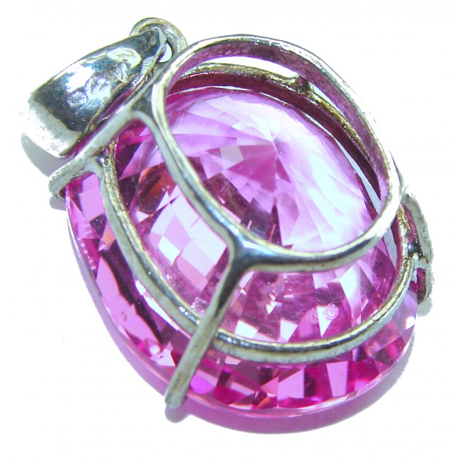 Oval cut 22.7 carat Genuine Pink Sapphire .925 Sterling Silver handcrafted pendant