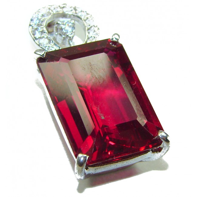 28.5 carat Red Topaz .925 Sterling Silver handmade pendant