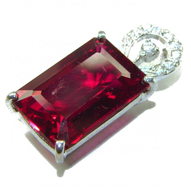 28.5 carat Red Topaz .925 Sterling Silver handmade pendant