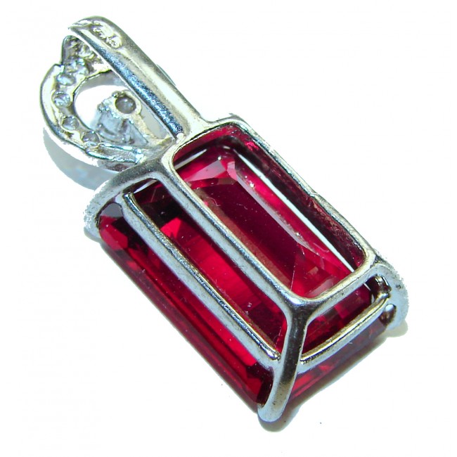 28.5 carat Red Topaz .925 Sterling Silver handmade pendant