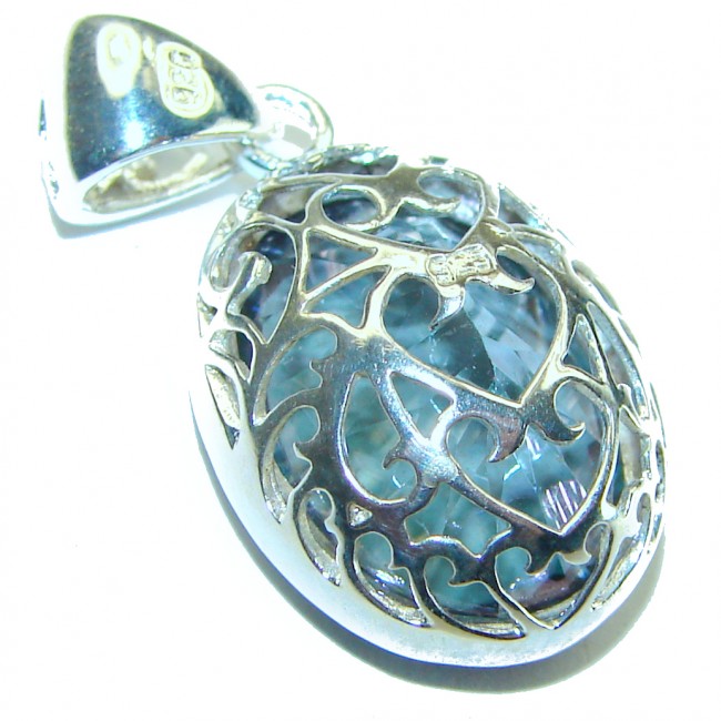 18.5 carat oval cut Mystic Topaz .925 Sterling Silver handcrafted Pendant