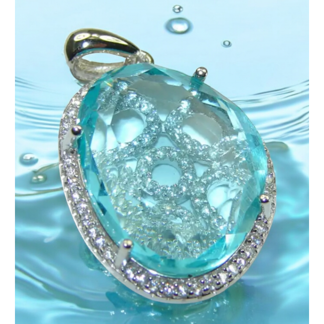 Luxurious 15.6 carat Swiss Blue Topaz .925 Sterling Silver handmade Pendant