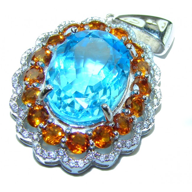 Luxurious 15.6 carat Swiss Blue Topaz Orange Sapphire .925 Sterling Silver handmade Pendant