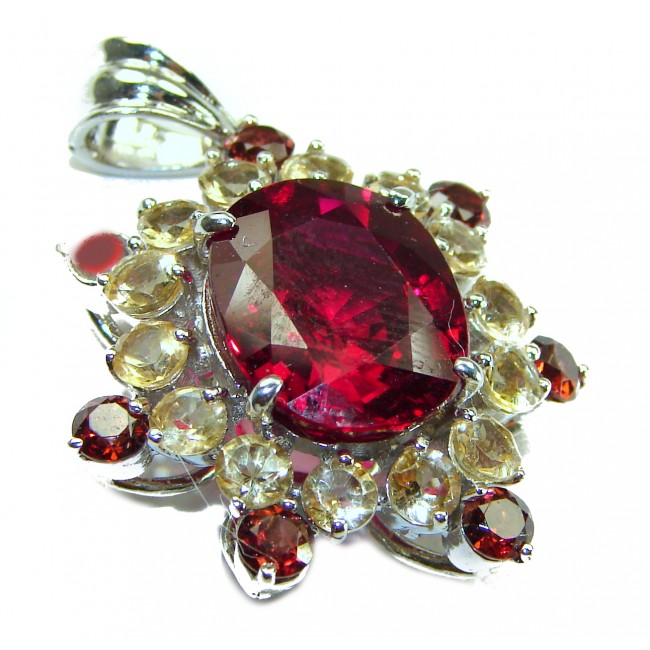 10.5 carat Red Topaz .925 Sterling Silver handmade pendant