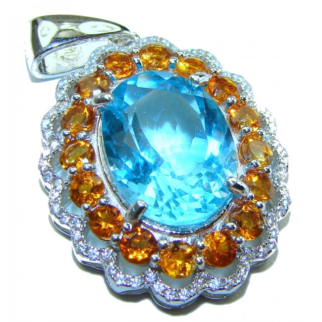 Luxurious 15.6 carat Swiss Blue Topaz Orange Sapphire .925 Sterling Silver handmade Pendant