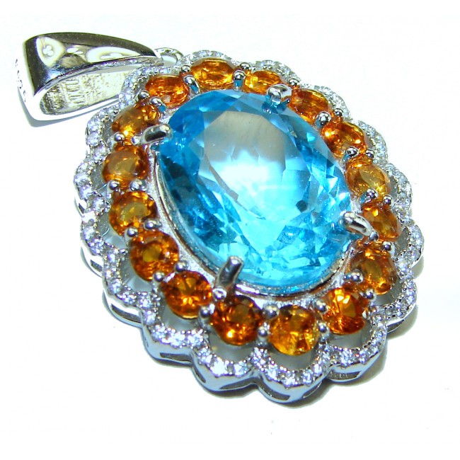 Luxurious 15.6 carat Swiss Blue Topaz Orange Sapphire .925 Sterling Silver handmade Pendant