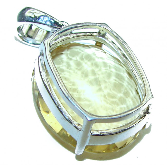 Oval cut 15.3 carat Lemon Quartz .925 Sterling Silver handcrafted pendant