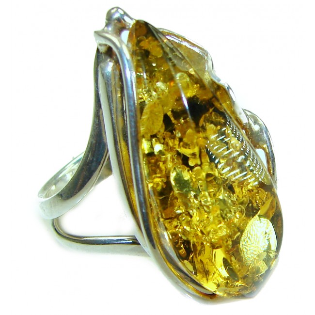 The best quality Golden Authentic Baltic Amber .925 Sterling Silver handcrafted ring; s. 7 adjustable