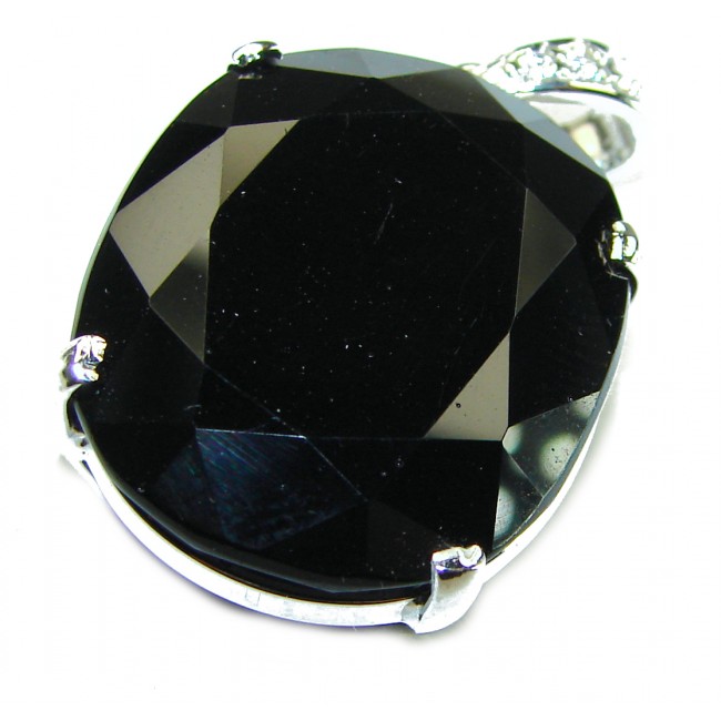 Luxurious oval cut 39.4 carat Deep Blue Sapphire .925 Sterling Silver handcrafted pendant