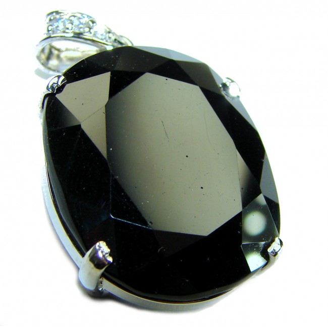 Luxurious oval cut 39.4 carat Deep Blue Sapphire .925 Sterling Silver handcrafted pendant